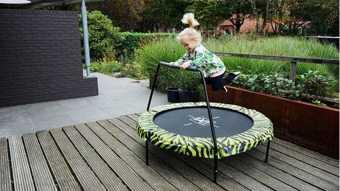 Playing outside in a small garden with EXIT Toys